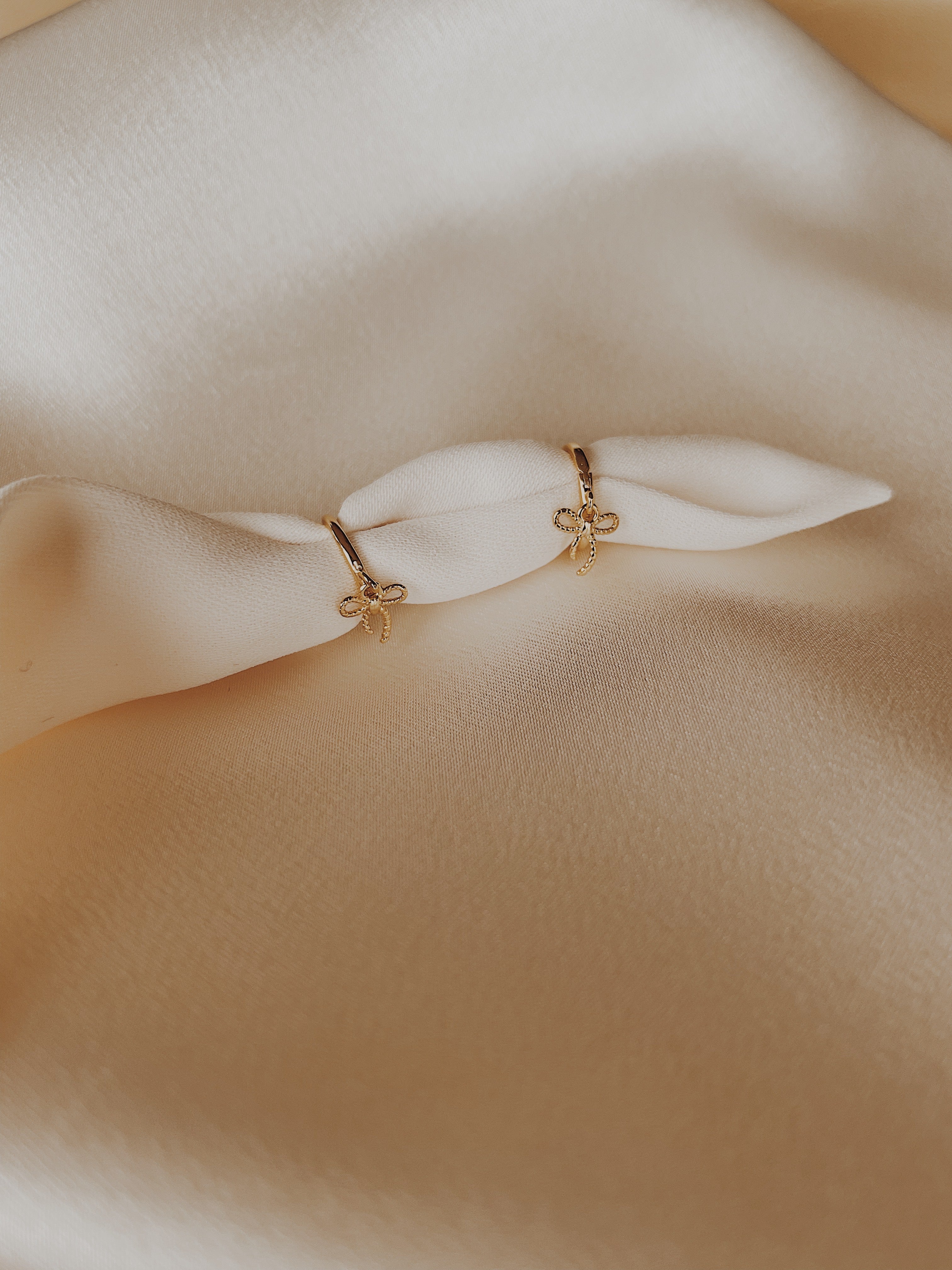 bow earrings | gold