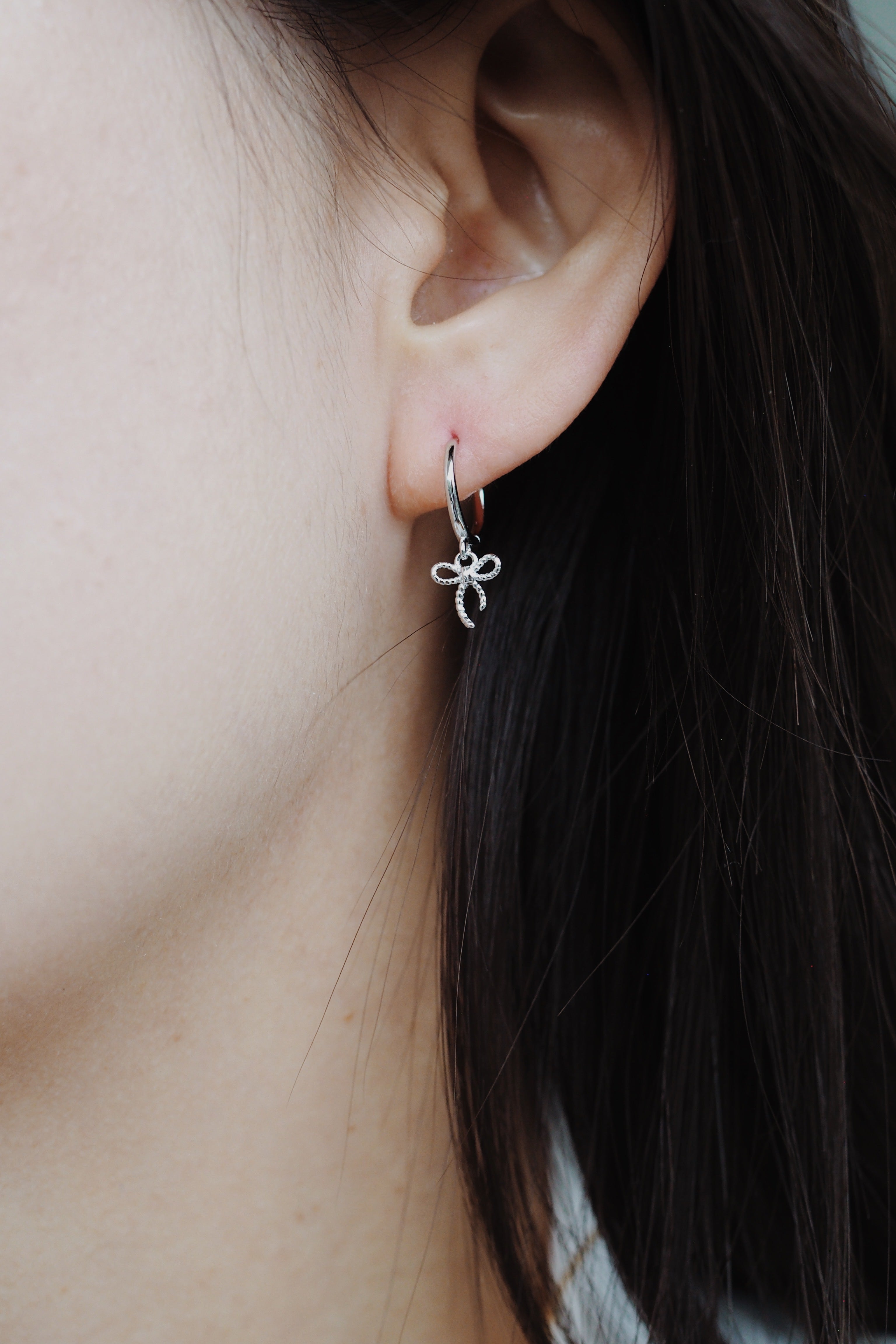 bow earrings | silver