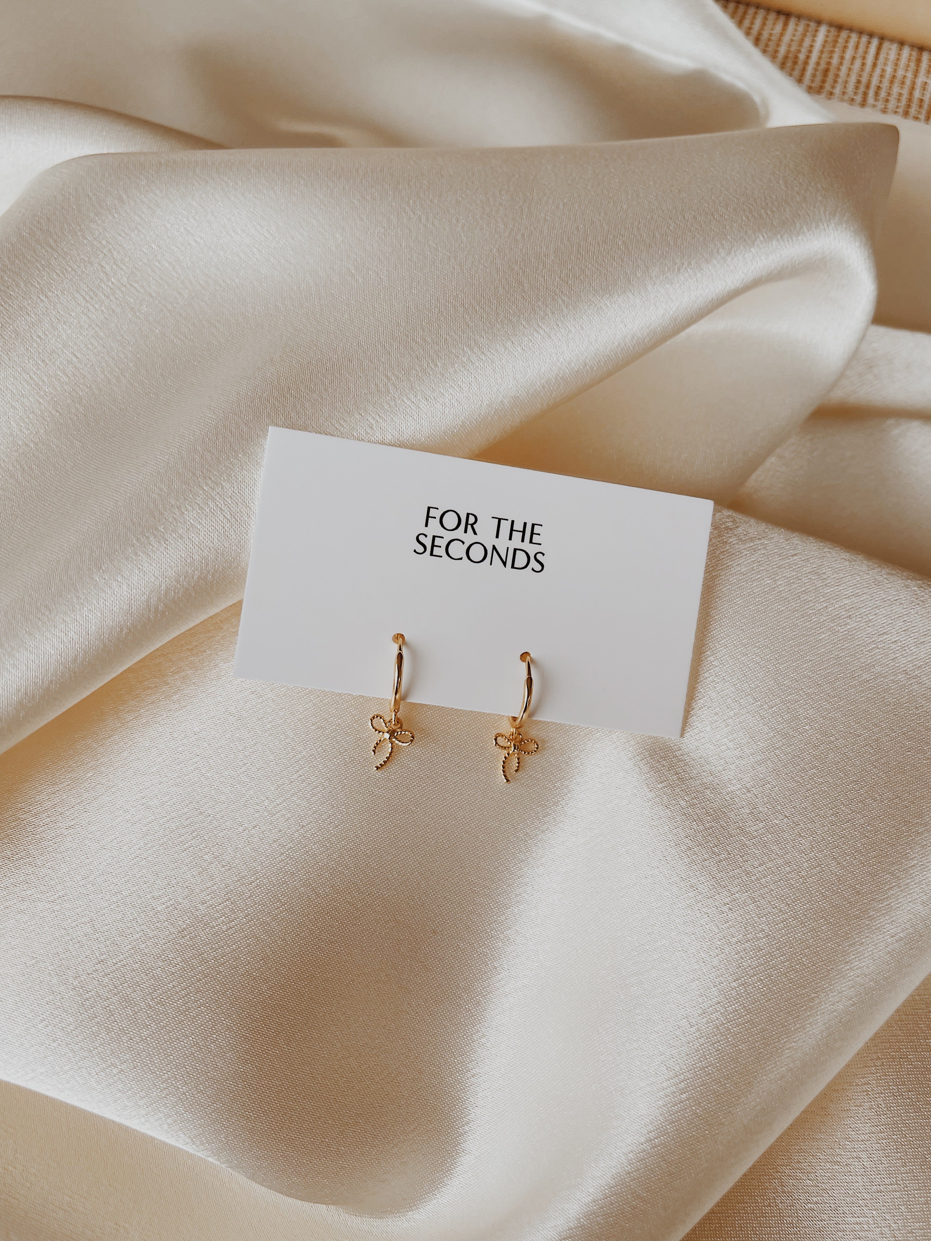 bow earrings | gold